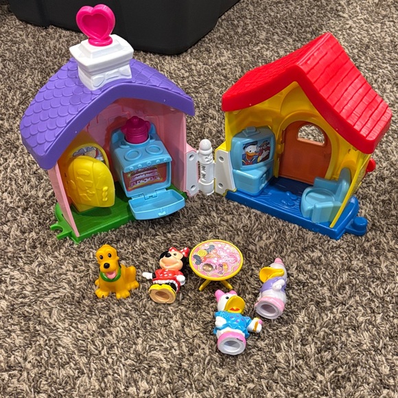Fisher-Price Little People Magic of Disney Mickey and Minnie's House Playset.